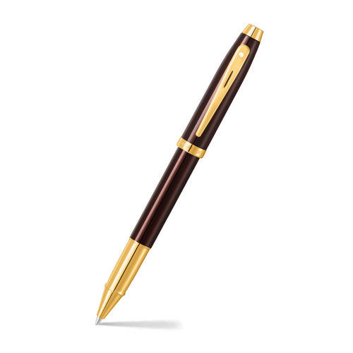 Sheaffer 100 9370 Glossy Coffee Brown Rollerball Pen With PVD Gold-Tone Trims angled writing shot