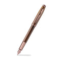 Sheaffer 100 9374 Coffee Edition Matte Brown Fountain Pen with Regal Brown PVD Trims angled writing shot