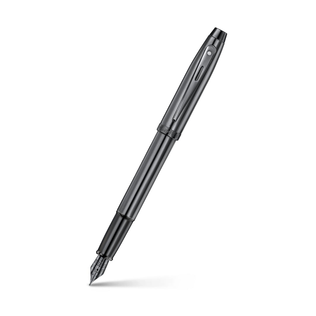 Sheaffer 100 9375 Ionic Gunmetal Grey Fountain Pen with Shiny PVD Trims angled writing shot