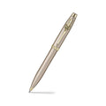 Sheaffer 100 Emily in Paris 9377 Champagne Gold Ballpoint Pen with Champagne Gold Trims and Bow-Shaped Clip Emblem angled writing shot