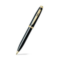 Sheaffer 100 Glossy Black Ballpoint Pen With Gold Trims angled writing shot