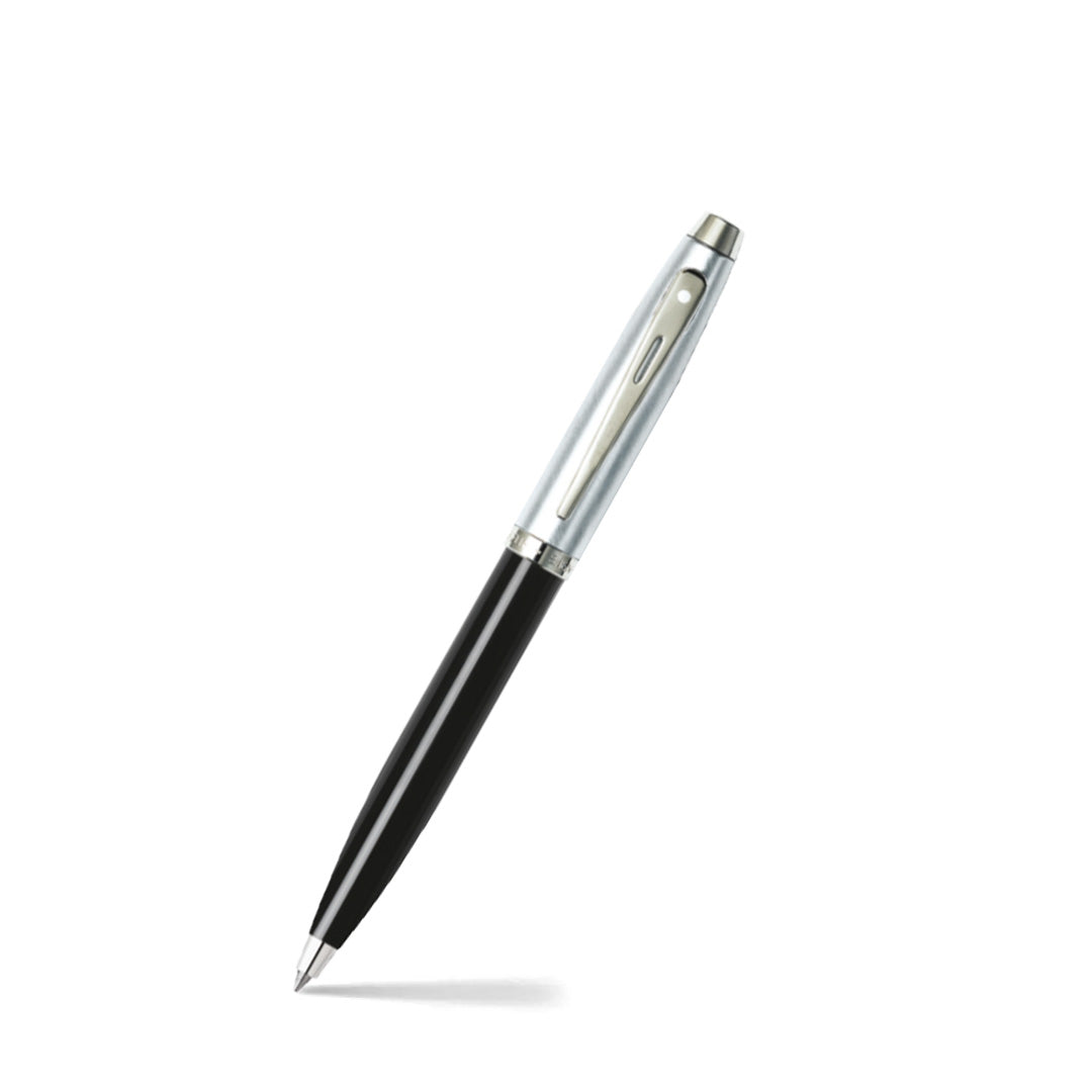 Sheaffer 100 Glossy Black Barrel Ballpoint Pen With Brushed Chrome Cap angled writing shot