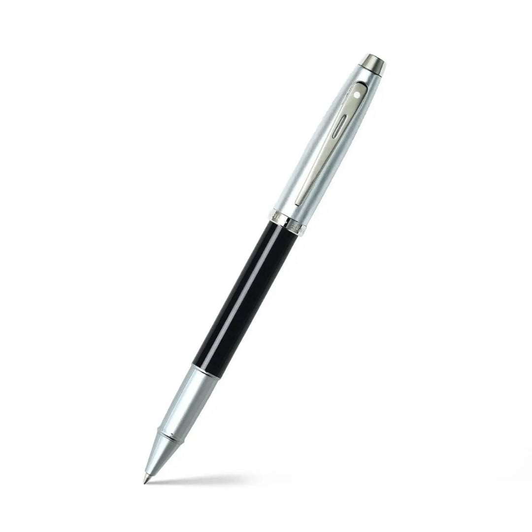 Sheaffer 100 Glossy Black Barrel Rollerball Pen With Brushed Chrome Cap angled writing shot