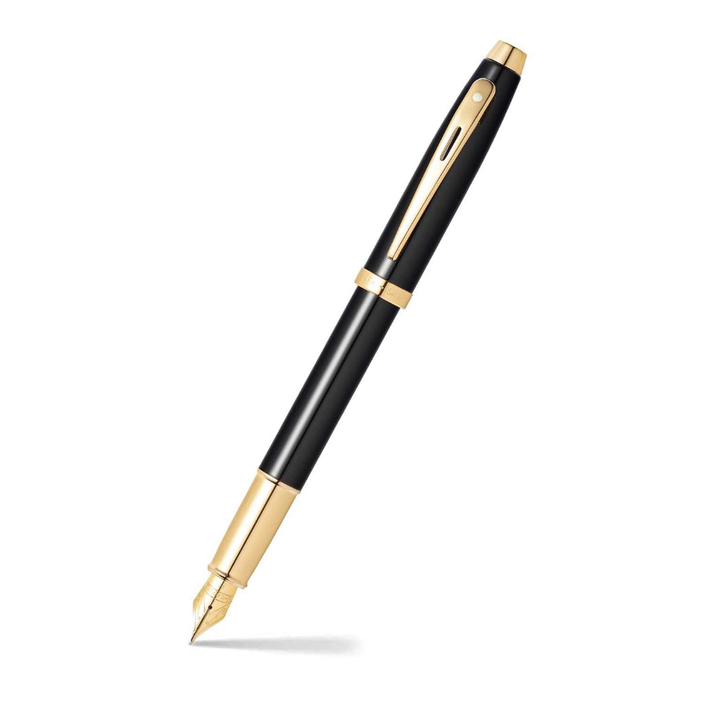 Sheaffer 100 Glossy Black Fountain Pen With Gold Trims angled writing shot