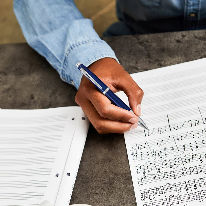 Sheaffer 100 Glossy Blue Rollerball Pen With Chrome Trims used on writing music notes