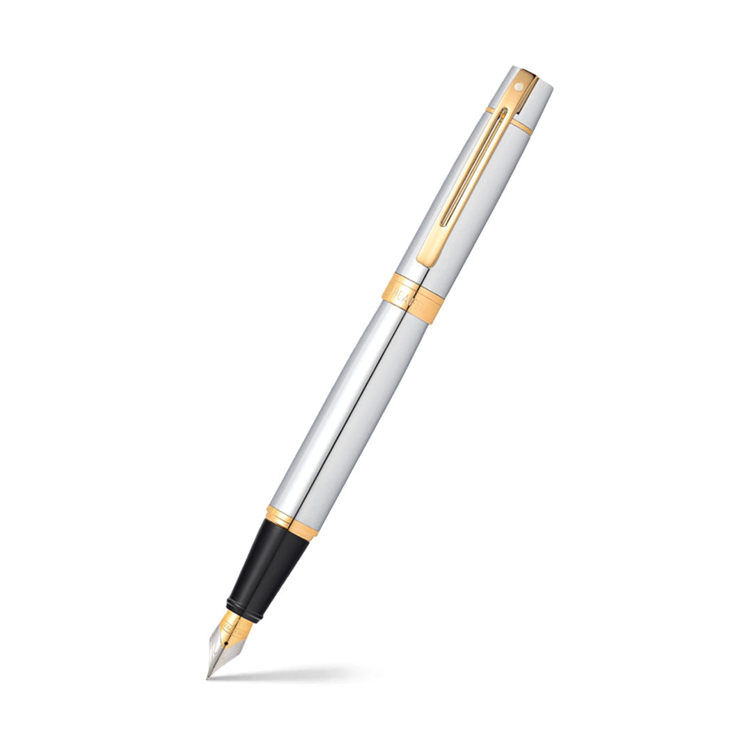 Sheaffer 300 Bright Chrome Fountain Pen With Gold Trims angled writing shot