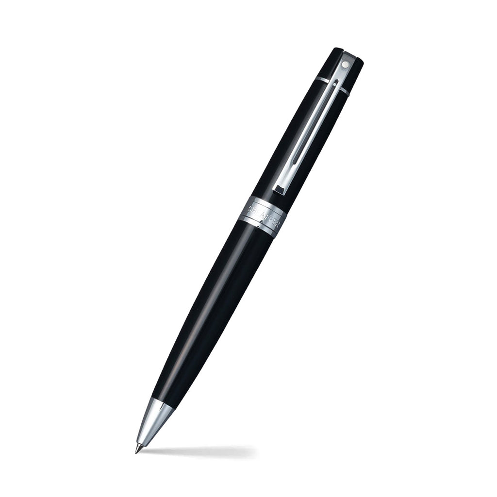 Sheaffer 300 Glossy Black Ballpoint Pen With Chrome Trims angled writing shot