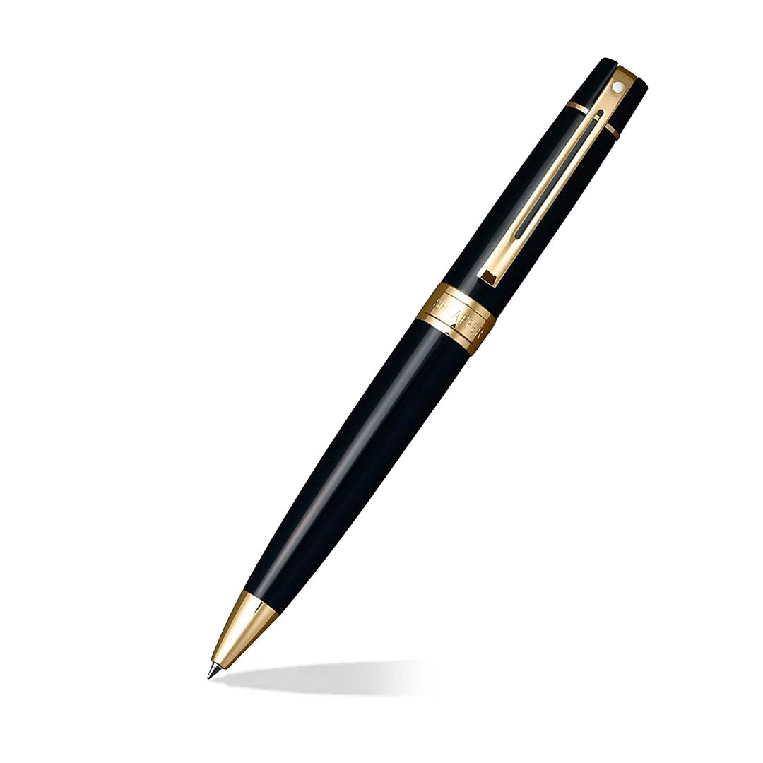 Sheaffer 300 Glossy Black Ballpoint Pen With Gold Trims angled writing shot