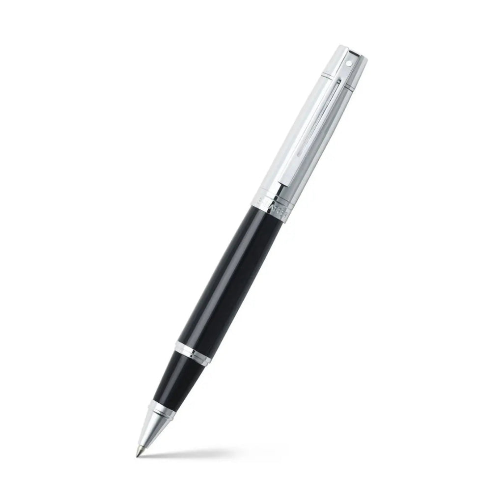 Sheaffer 300 Glossy Black Barrel Rollerball Pen With Bright Chrome Cap angled writing shot