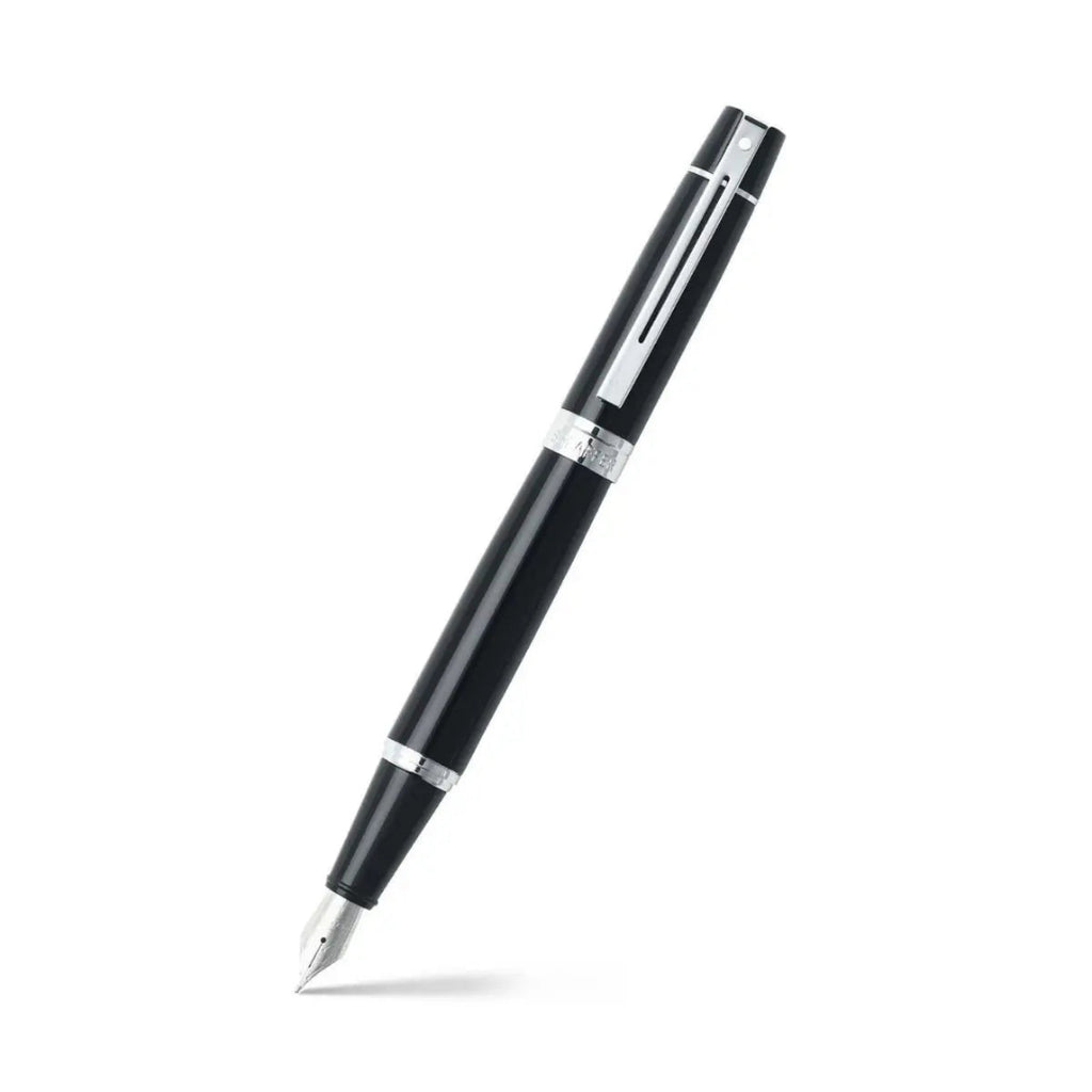 Sheaffer 300 Glossy Black Fountain Pen With Chrome Trims angled writing shot