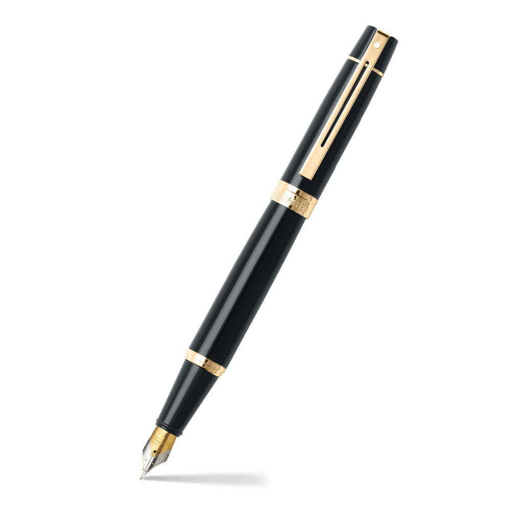 Sheaffer 300 Glossy Black Fountain Pen With Gold Trims angled writing shot