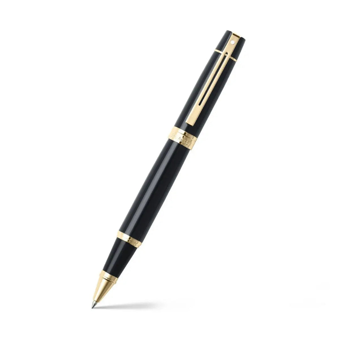 Sheaffer 300 Glossy Black Rollerball Pen With Gold Trims angled writing shot