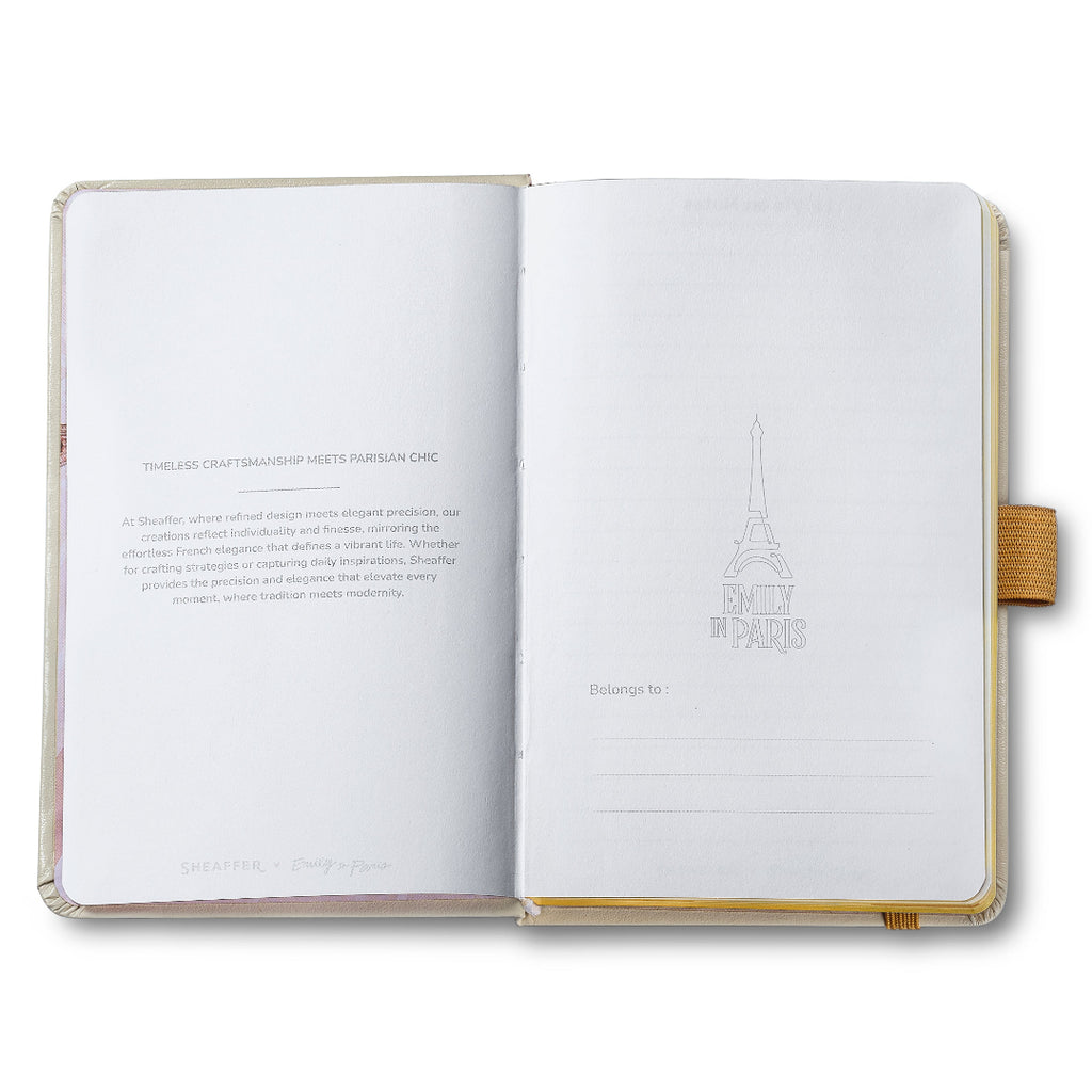 Sheaffer Gift Set ft. 100 Emily in Paris 9377 Champagne Gold Ballpoint Pen with Champagne Gold Trims and Hardbound Small Notebook belongs to