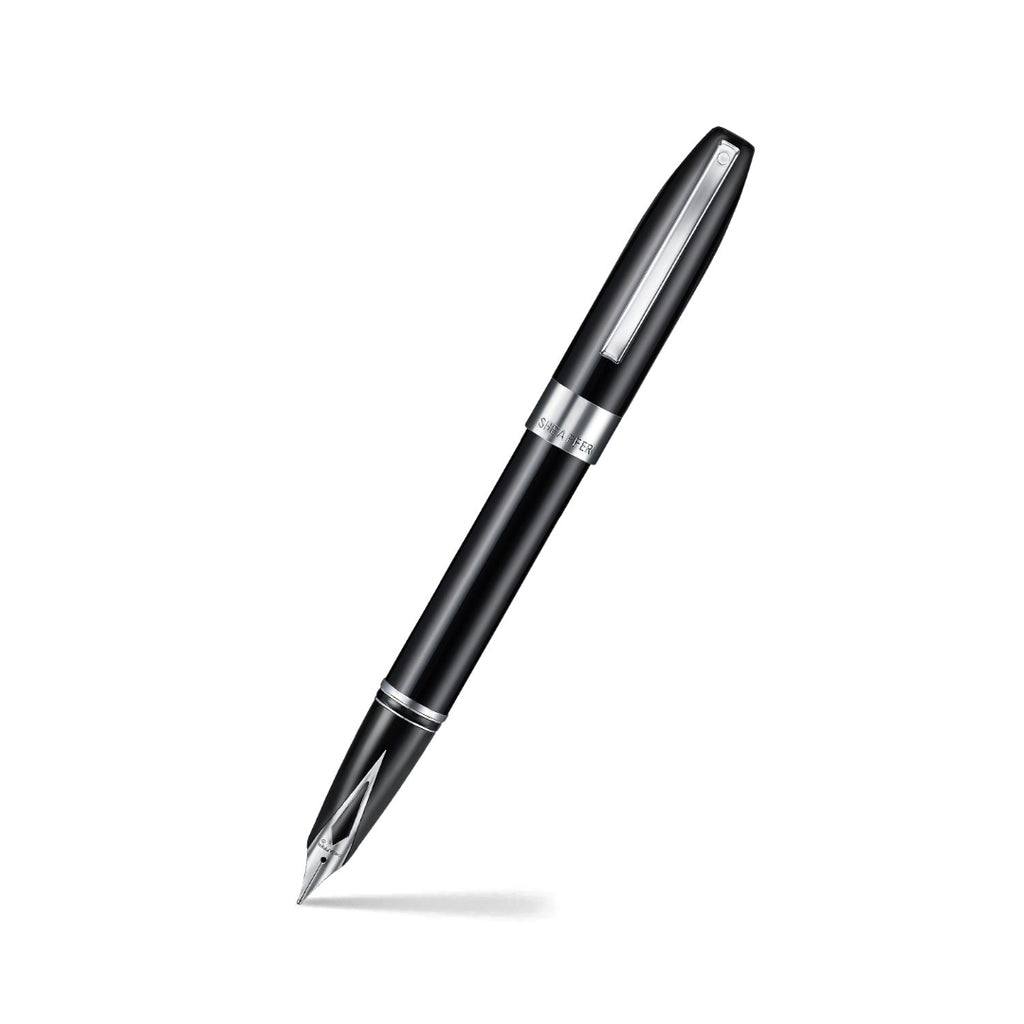 Sheaffer Legacy 9064 Glossy Black Inlaid Nib Fountain Pen with Chrome Trims angled writing shot
