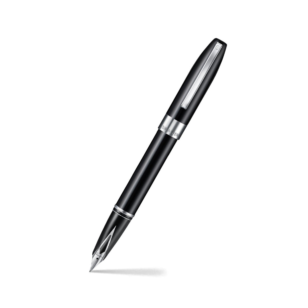Sheaffer Legacy 9064 Glossy Black Inlaid Nib Fountain Pen with Chrome Trims angled writing shot