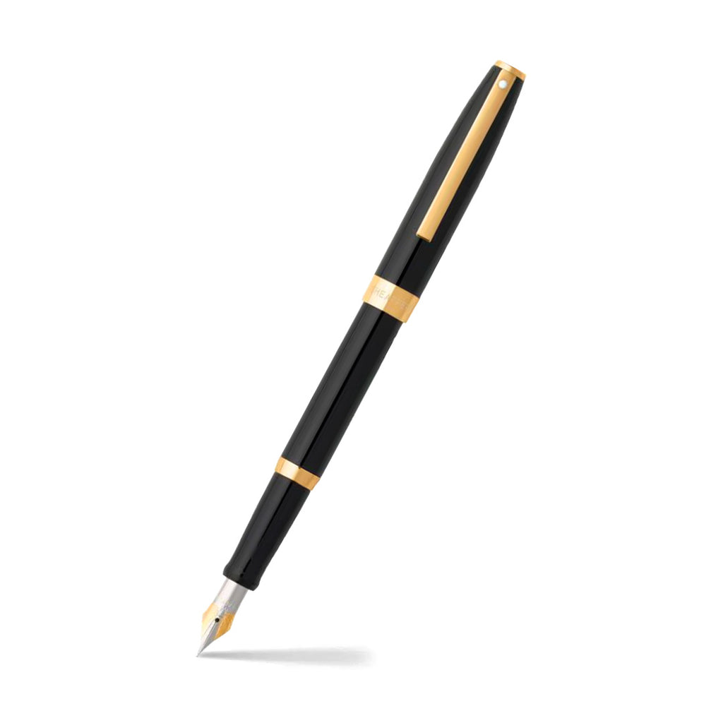 Sheaffer Sagaris Glossy Black Fountain Pen With Gold Trims angled writing shot