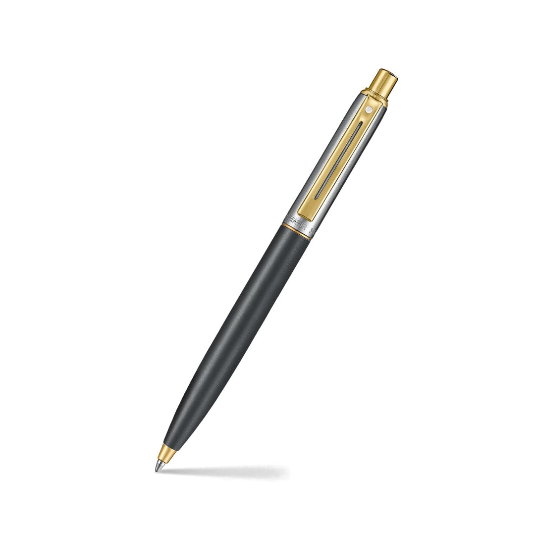 Sheaffer Sentinel Metal 334 Matte Black Barrel and Brushed Chrome Cap Ballpoint Pen with Gold Trims angled writing shot