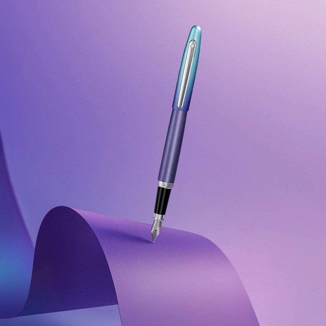 Sheaffer VFM 9430 Expressions Blue and Purple Pearlised Gradient Fountain Pen with Chrome-Plated Trims shot on a purple background