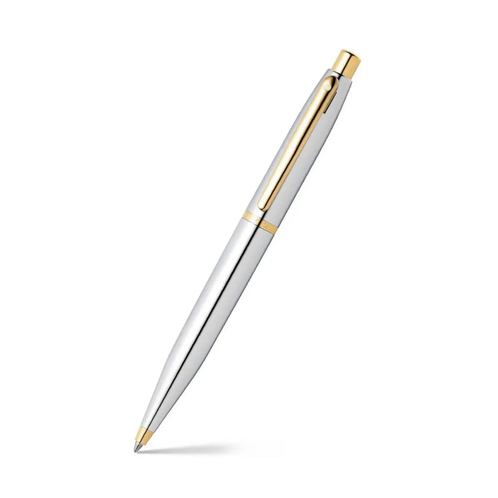 Sheaffer VFM Polished Chrome Ballpoint Pen With Gold Trims angled writing shot