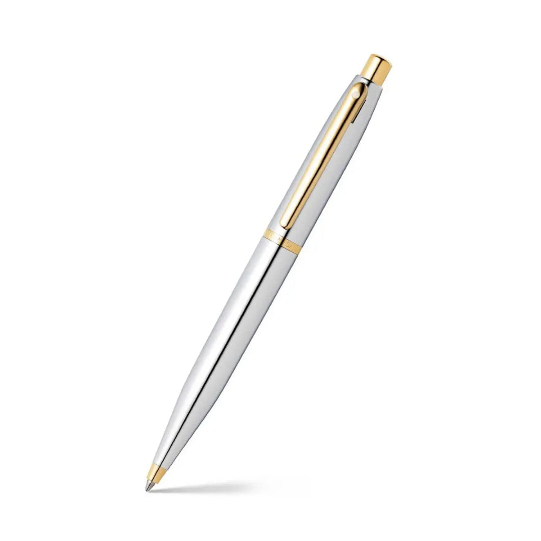 Sheaffer VFM Polished Chrome Ballpoint Pen With Gold Trims angled writing shot